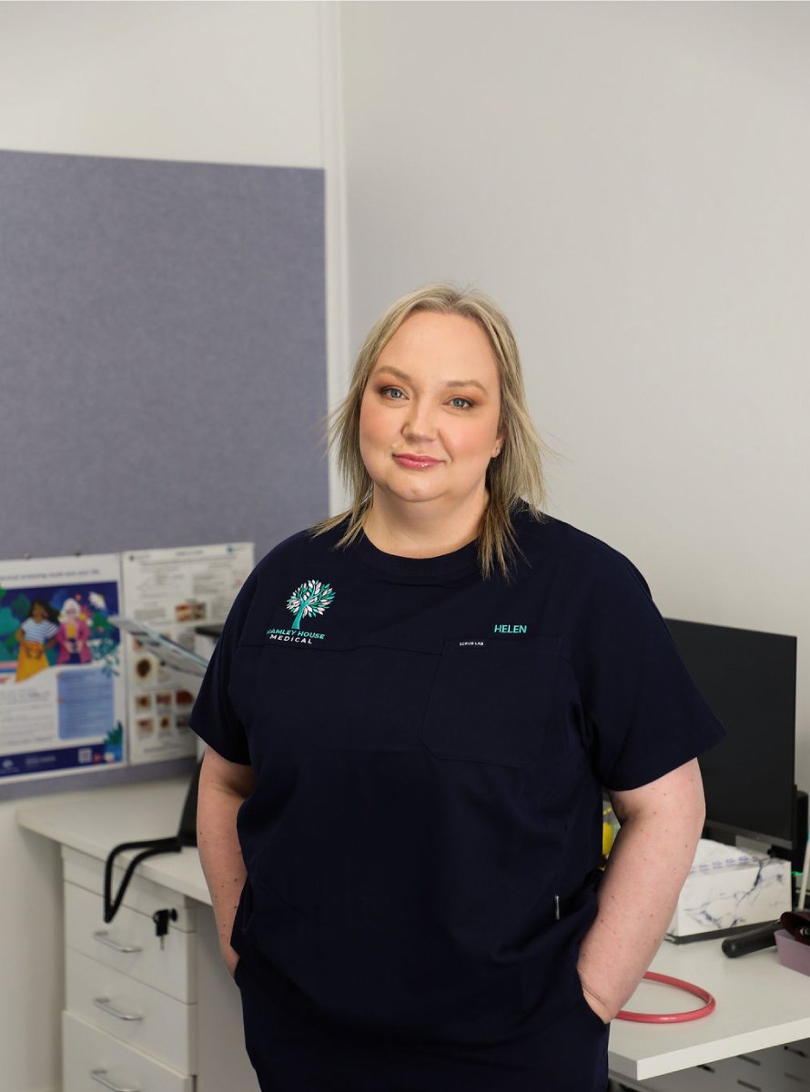 Helen Partridge in a consulting room, smiling